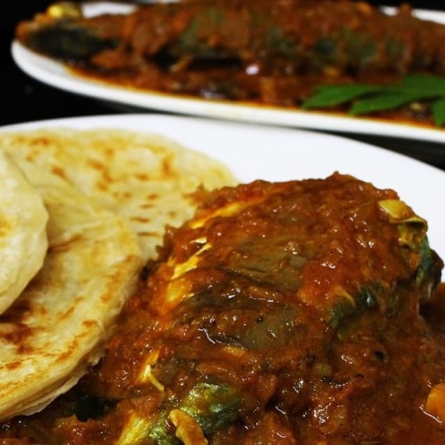 Kerala Paratha with Fish Curry.