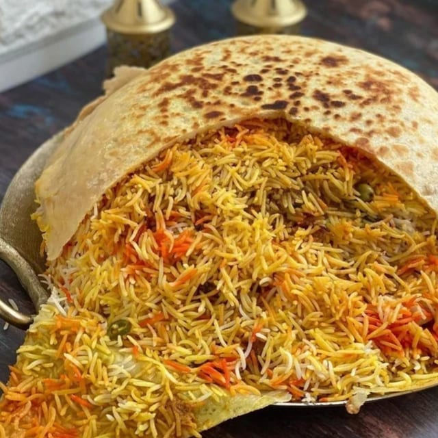 Parda Boneless - Chicken 65 Biryani.
